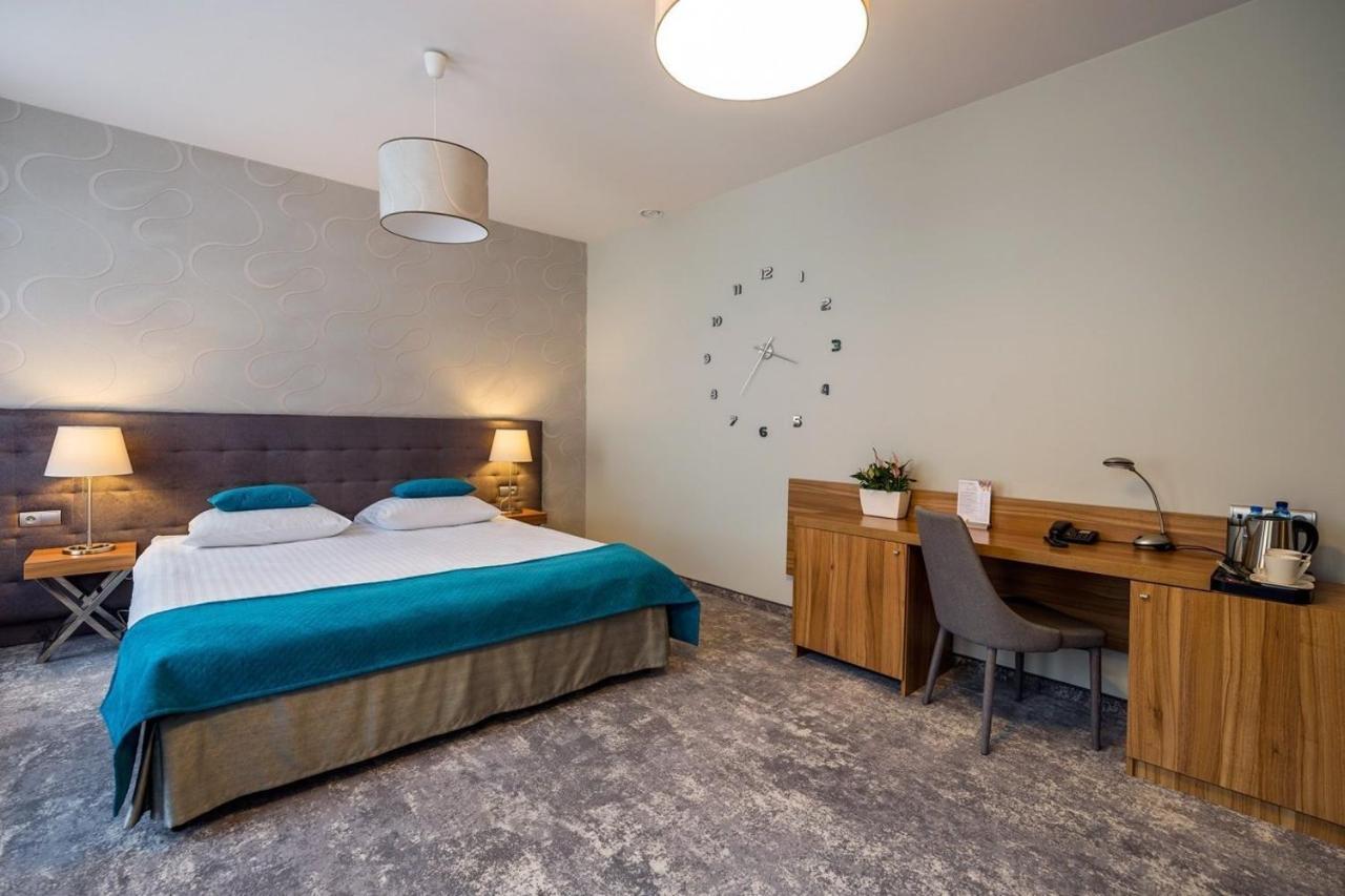 Deluxe Suite met 1 Kingsize Bed en 1 Slaapbank