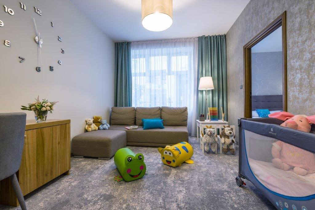 Suite met 1 Queensize Bed en 1 Slaapbank