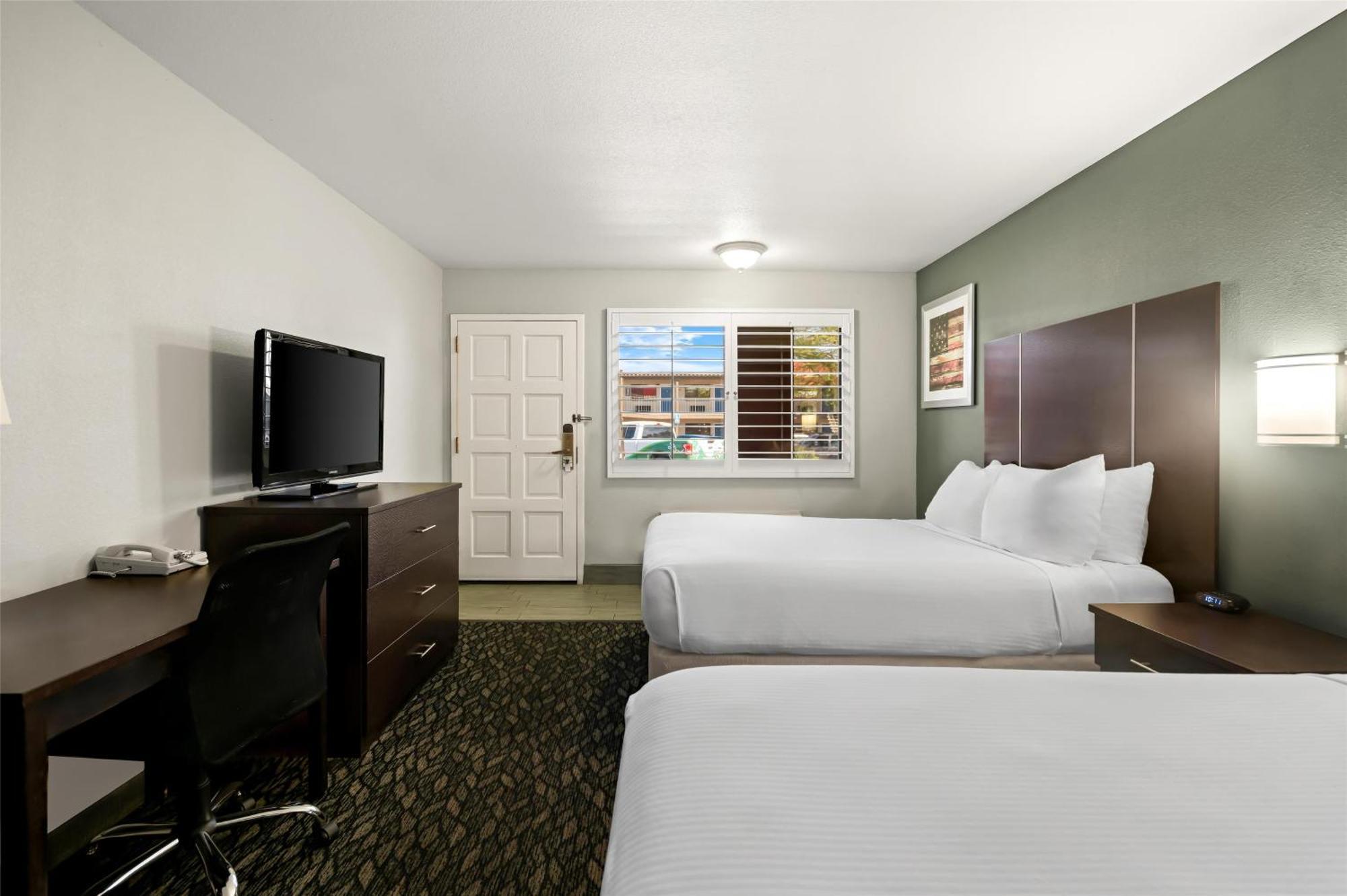 Queen Room Two Queen Beds Bath Tub Disability Access or Non-Smoking