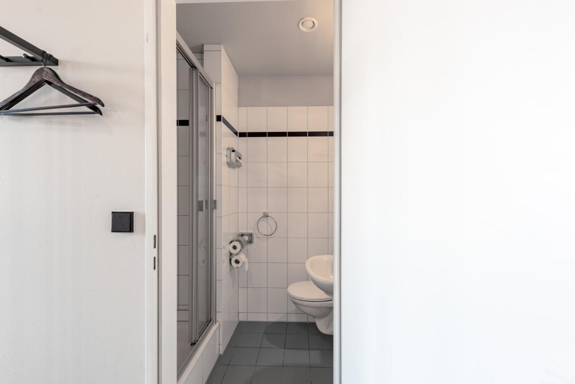 Kamer met twee aparte bedden voor eenpersoonsgebruik
